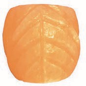 Himalayan salt carved into a leaf shape.